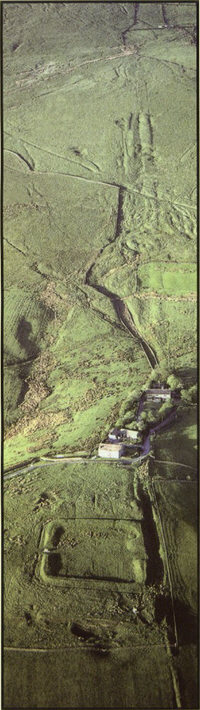 Castleshaw Roman Fort with the Roman road rising towards Standedge